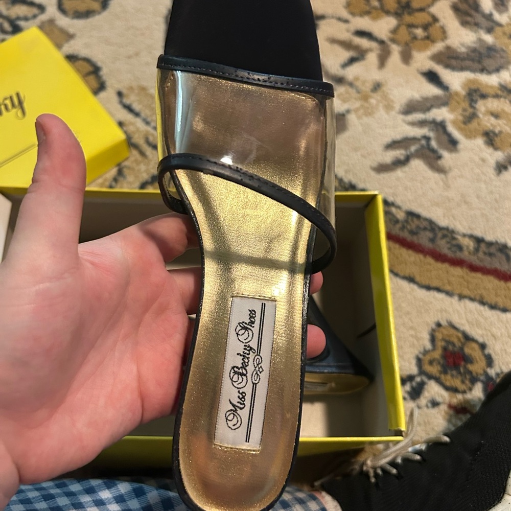 Elegant Black and Gold Heels for a Glamorous Look